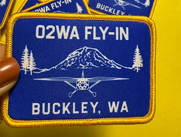 Custom woven patch with fine stitching